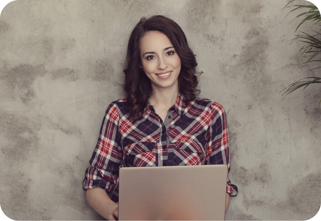 Beautiful Young Woman With Laptop Computer 1