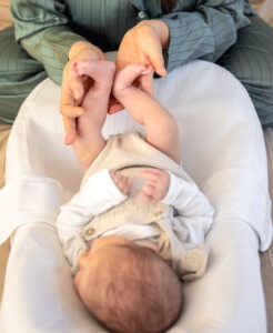 A Young Mother With A Newborn Baby. Newborn Baby.